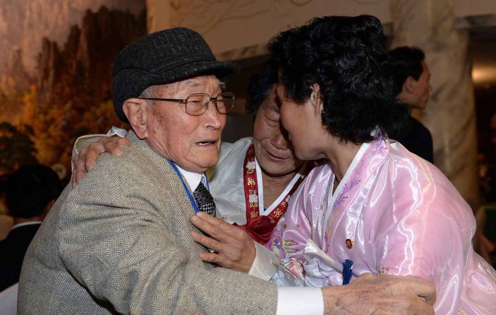 Families torn apart for more than 60 years -- separated by the Korean War -- were given the chance to reunite for few hours at a mountain resort. Here, South Korean Ryu Young-Shik (L), 92, meets with his North Korean relatives.