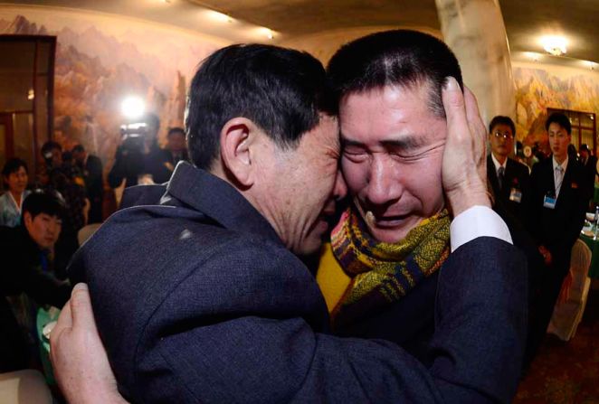 South Korean Park Yang-Gon (L) meets with his North Korean brother Park Yang-Soo. Without any regular forms of communications between the two Koreas, the family members have gone decades without contact.