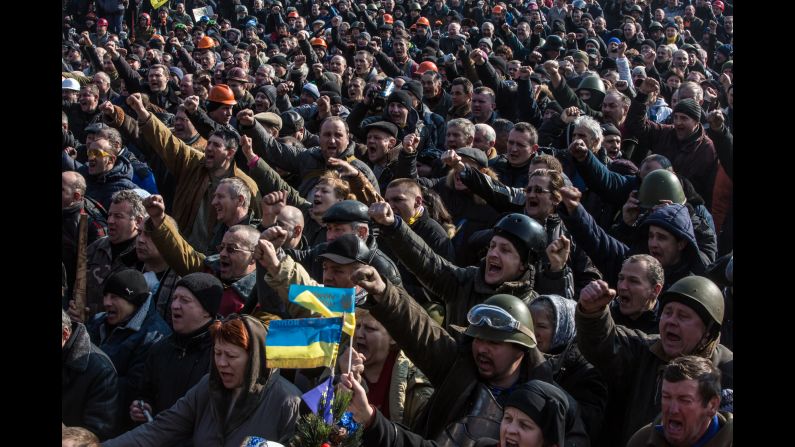 Ukrainian demonstrators gather in Kiev's Maidan, or Independence Square, on February 21, 2014, a day after the bloodiest day of revolution protests. <a href="index.php?page=&url=http%3A%2F%2Fwww.cnn.com%2F2015%2F02%2F20%2Feurope%2Fukraine-conflict%2Findex.html">Nearly 50 activists were killed and hundreds more injured in clashes </a>in the square on February 20, 2014. The street protests soon led to the ouster of pro-Russian President Viktor Yanukovych and triggered a chain of events that included Russia's annexation of Ukraine's Crimean Peninsula and fighting in Eastern Ukraine with pro-Russian separatist forces. 