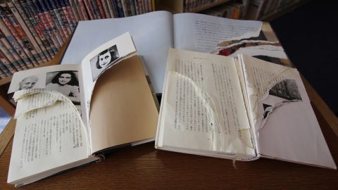 Ripped copies of Anne Frank's diary and related books at Shinjuku City Library in Tokyo on February 21, 2014.