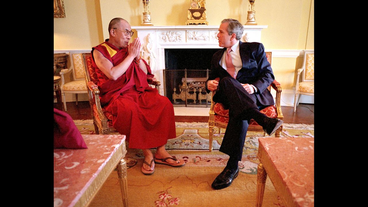 President George W. Bush meets with the Dalai Lama in the Oval Office in May 2001.