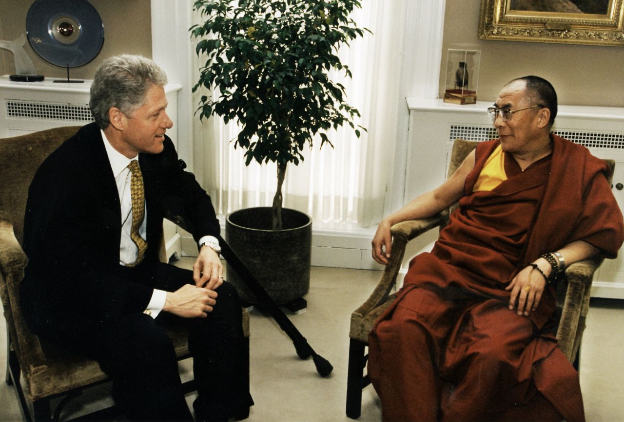 The Dalai Lama meets with President Bill Clinton at the White House.