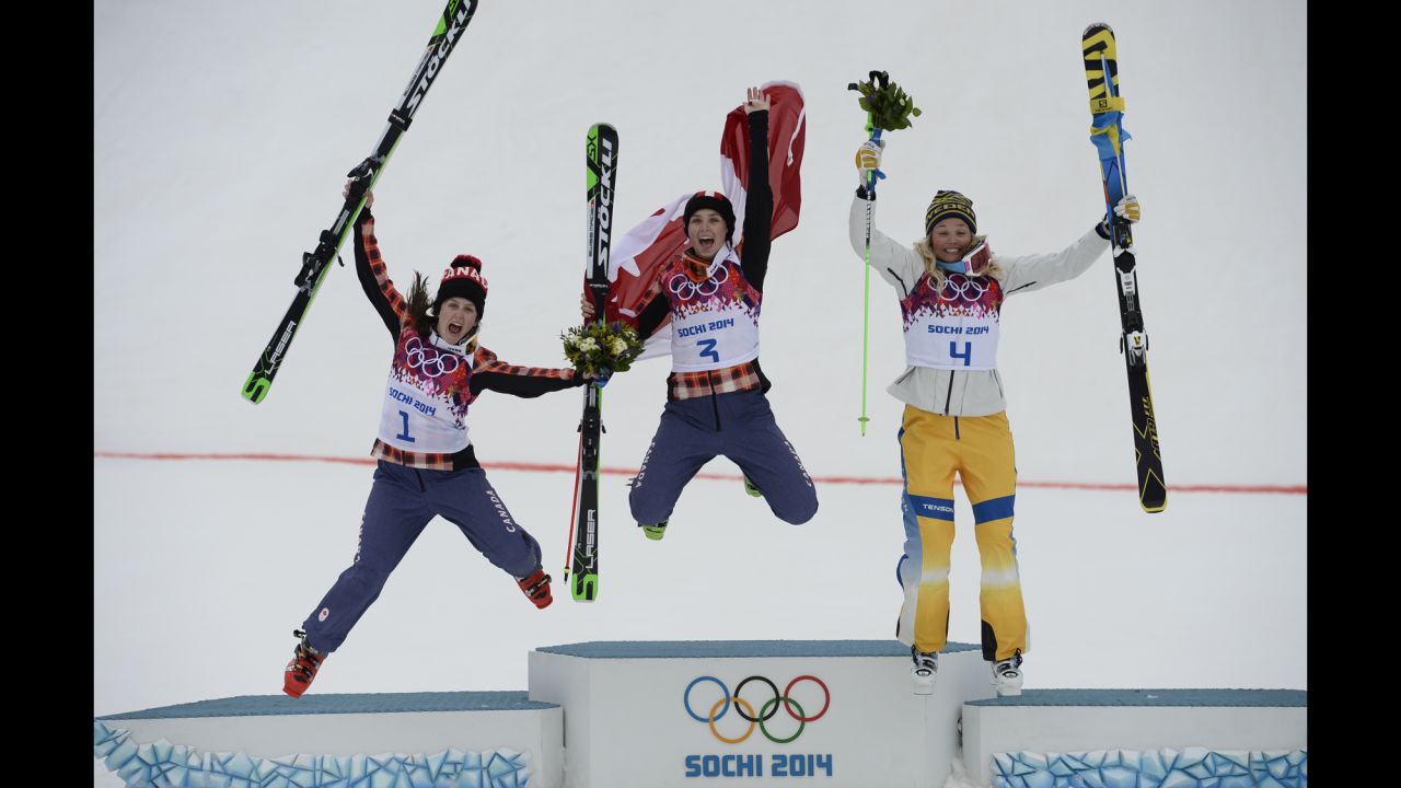 From left, silver medalist Kelsey Serwa of Canada, gold medalist Marielle Thompson of Canada, and bronze medalist Anna Holmlund of Sweden celebrate on the podium after the women's ski cross competition on February 21.