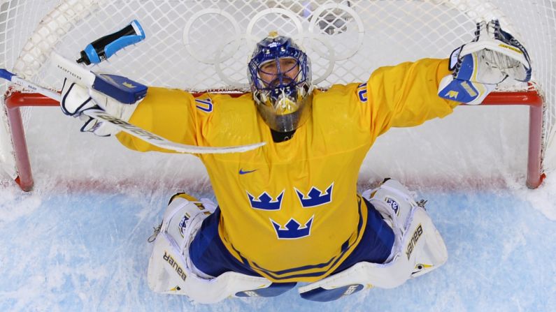 Swedish goaltender Henrik Lundqvist celebrates his team's win against Finland in the hockey semifinals on February 21.