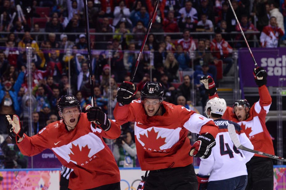 Canada's Jamie Benn, second from left, celebrates scoring the only goal in the men's hockey semifinal between Canada and the United States on Friday, February 21. 