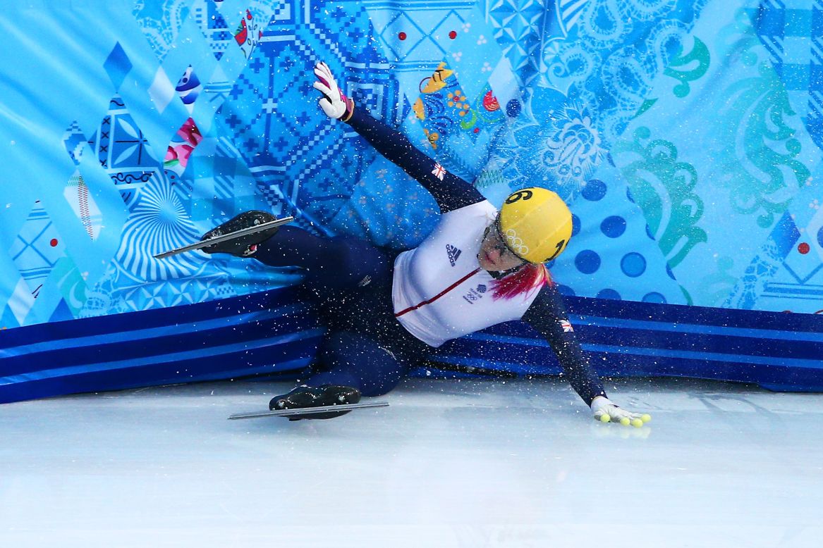 Elise Christie of Great Britain hits the wall while competing in a 1,000-meter short track semifinal.