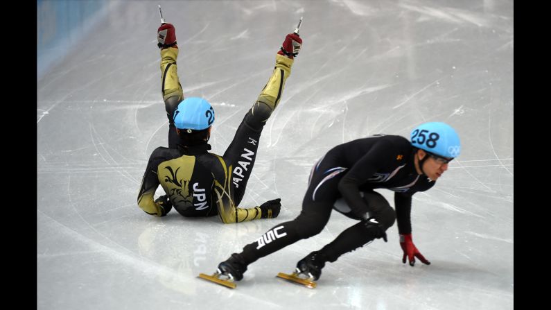 Short track speedskater Satoshi Sakashita of Japan falls as he competes in the quarterfinals of the men's 500 meters on February 21.
