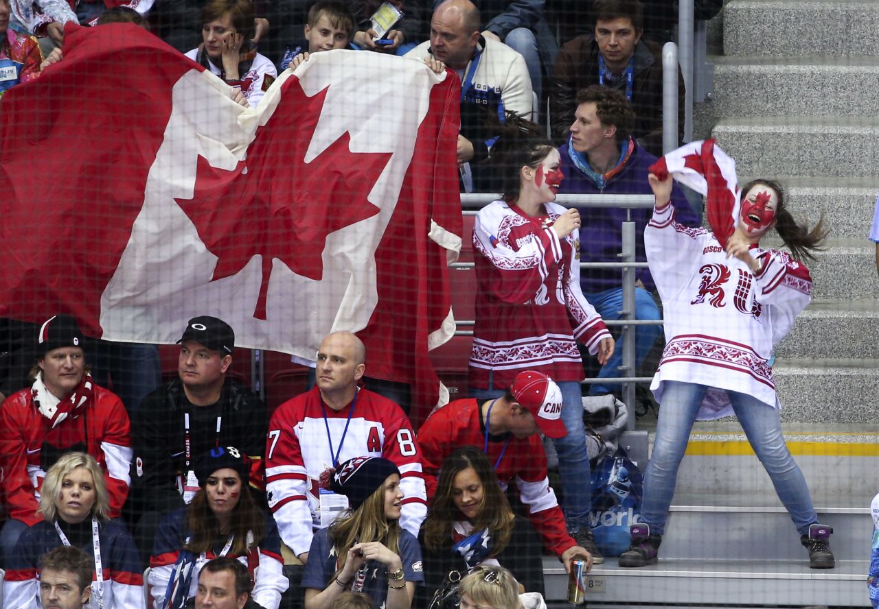 Fans celebrate Canada's 1-0 defeat of the United States.