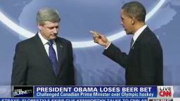 erin obama loses beer bet to canada prime minster harper_00010620.jpg