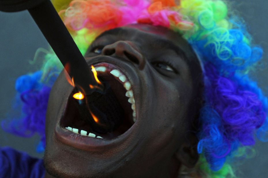A fire-swallower performs during the Carnival of Delmas in Port au Prince, Haiti, on February 21.