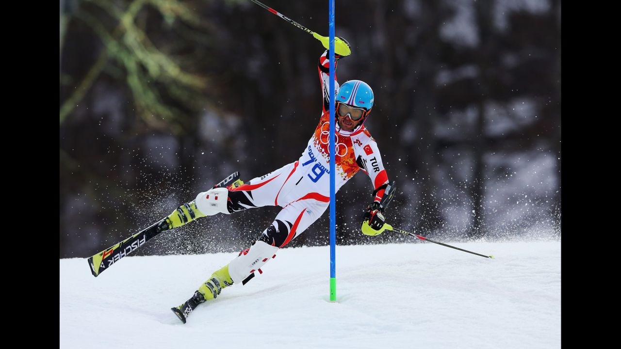 Emre Simsek of Turkey wipes out during the first run during the men's slalom on February 22. 
