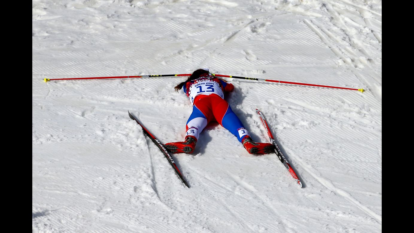 Eva Vrabcova-Nyvltova of the Czech Republic collapses on February 22 after the women's 30-kilometer mass start free cross-country event.