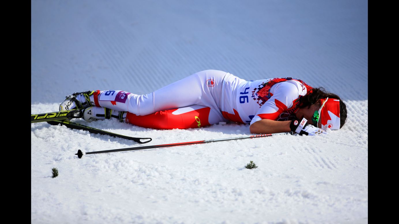 Emily Nishikawa of Canada collapses after the women's 30-kilometer mass start free cross-country event on February 22. 