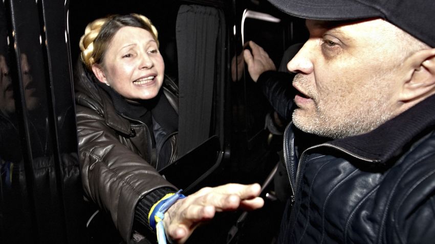 Former Ukrainian Prime Minister Yulia Tymoshenko is greeted by supporters shortly after being freed from prison in Kharkiv on Saturday, February 22.