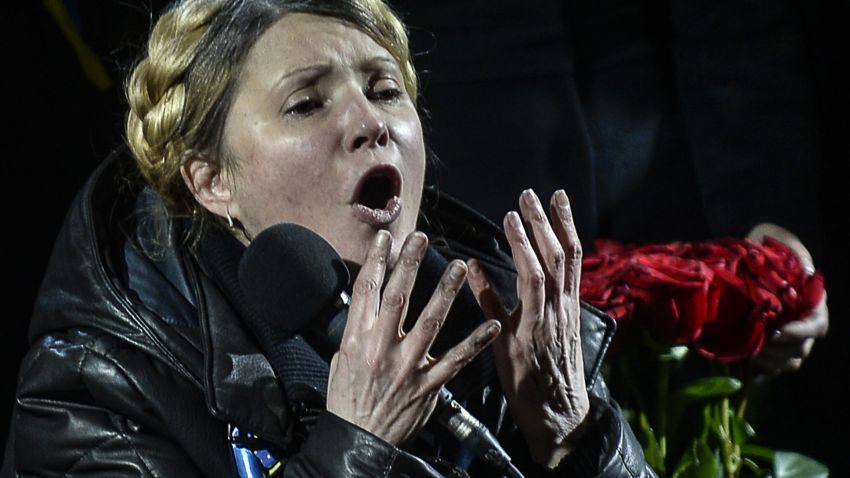 Newly freed Ukrainian opposition icon Yulia Tymoshenko speaks at Independence Square on February 22, 2014, moments after parliament voted to hold early presidential elections in May. Tymoshenko received a rapturous welcome on Independence Square. 'You are heroes
