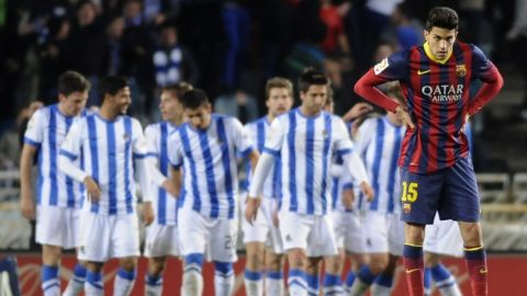 Barcelona defender Marc Bartra, right, can only look away after Real Sociedad scored Saturday. 