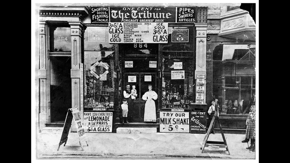 A soda parlor is seen on Chicago's South Western Avenue in 1895. The Chicago Tribune newspaper, shown here being sold for 1 cent, is still in publication today.