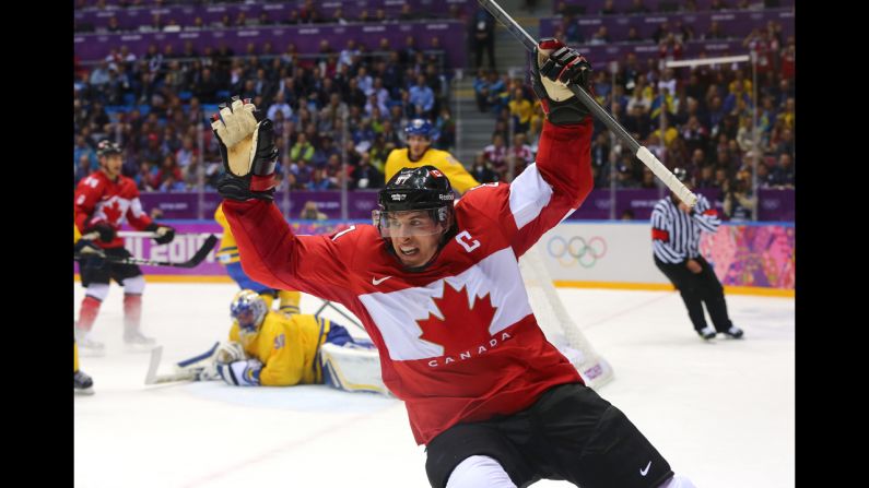 Sidney Crosby celebrates after scoring Canada's second goal during the men's ice hockey gold medal match against Sweden on Sunday, February 23. Most of us know the Winter Olympics through the power of television, as a spectacle in constant motion. Seeing the Games through still photography is a different experience altogether. Here's a look at the most compelling images from the word's best photographers at Sochi 2014. | <em>More photos:</em> <a href="index.php?page=&url=http%3A%2F%2Fwww.cnn.com%2F2014%2F02%2F08%2Fworldsport%2Fgallery%2Ffalling-down-in-sochi%2Findex.html"><em>Falling down in Sochi </em></a>
