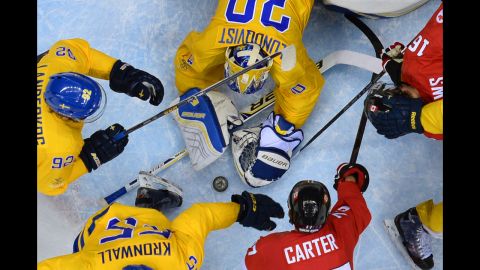 Swedish goalie Henrik Lundqvist makes a save during the hockey final against Canada on February 23.