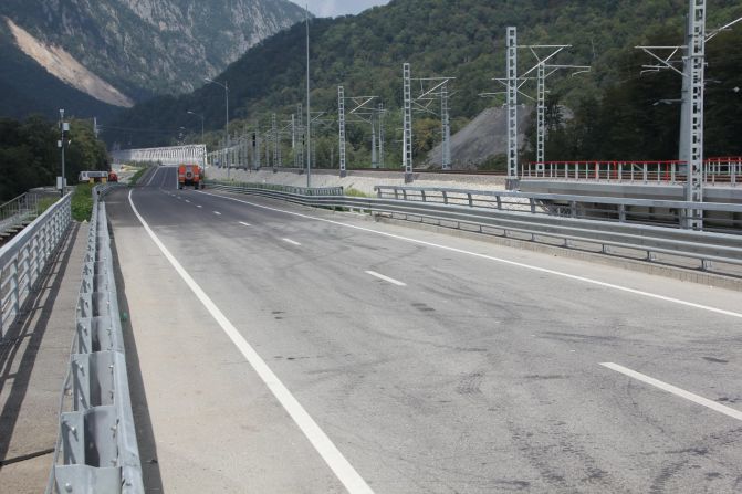 The so-called "Most Expensive Road In The World' runs 25 miles from the coastal Winter Games site in Sochi to the alpine venues nearly 2000 feet above sea level in Krasnaya Polyana, Russia. The Wall Street Journal valued its cost at $9 billion though Oleg Toni, Russian Railways Vice President, would not confirm this figure.