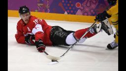 Canada forward Jonathan Toews (16) moves the puck against Sweden in the second period of the gold medal men's hockey game at the Winter Olympics in Sochi, Russia, Sunday, Feb. 23, 2014. (Brian Cassella/Chicago Tribune/MCT)