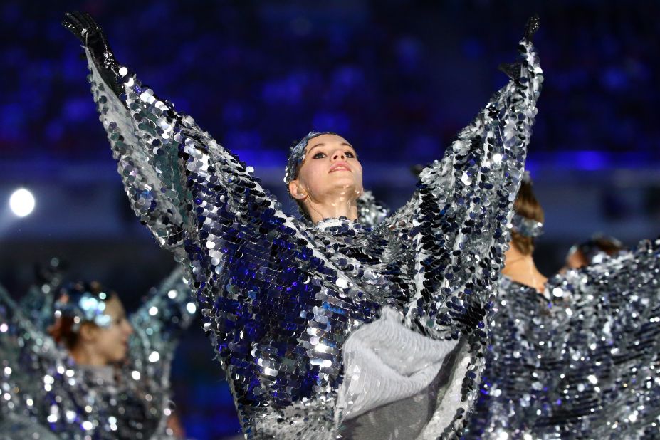  A dancer gleams during the closing ceremony.