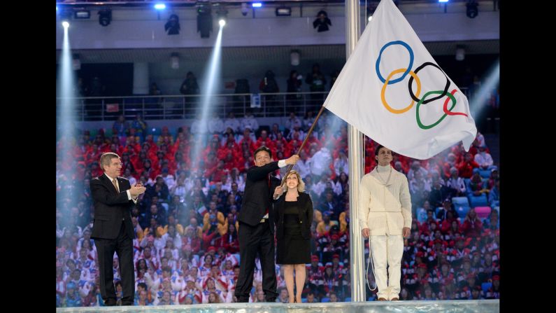 The Olympic flag is handed over to Lee Seok-rai, mayor of Pyeongchang. 