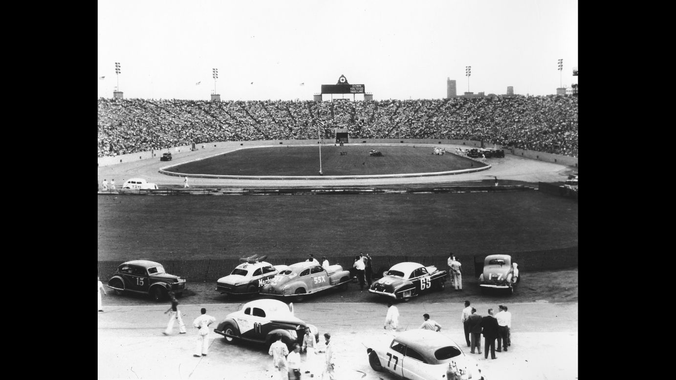 Cars prepare to race at Soldier Field. The stadium, on Chicago's South Side, first opened in 1924 and is still the home of the Chicago Bears today.