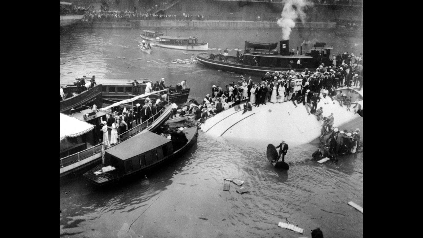 One of the worst tragedies to strike Chicago happened on July 24, 1915, when the SS Eastland capsized in the Chicago River with 2,500 passengers aboard. The passenger ship was docked at the time. The cause of the disaster is still unclear. Some have speculated that the Eastland had a faulty ballast system or additional lifeboats that made it top-heavy. More than 840 people died after passengers spilled into the river, while others -- mostly women and children -- were trapped in underwater cabins. Here, survivors stand atop the capsized vessel.