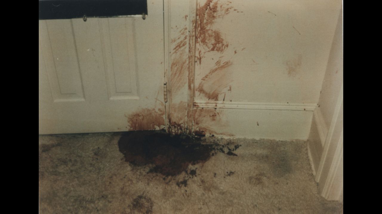 Holloway said he found her bloodied and battered body stuffed in this bedroom closet. Prosecutors said Elmore forced his way into the house through the back door to commit a robbery. An attack occurred in the kitchen, where Edwards suffered a blow so powerful that a denture plate flew out of her mouth, according to testimony.