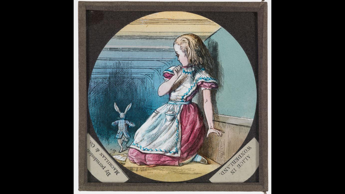 Tenniel's illustrations were also used for slides for the magic lantern, an early form of projector. This slide show's a scene from "Alice in Wonderland" of Alice and the White Rabbit. 