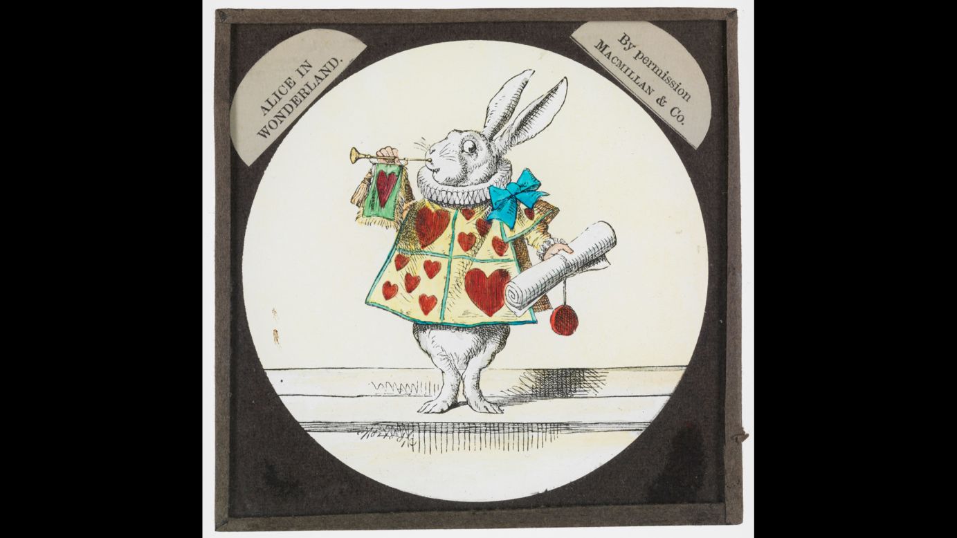 This slide from "Alice in Wonderland" shows the rabbit dressed as a member of the Red Queen's court. 