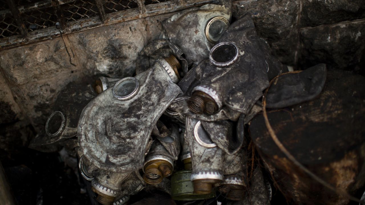 Gas masks used by protesters sit next to a barricade in Independence Square on February 24.