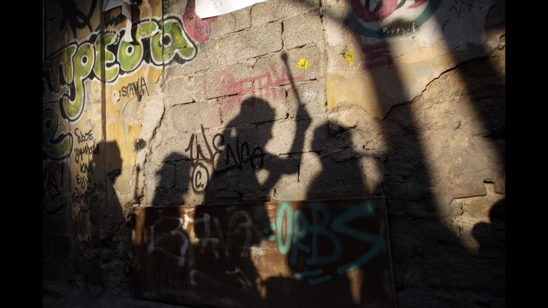 Shadows of musicians are cast against a wall during carnival celebrations in Athens, Greece, on February 23.