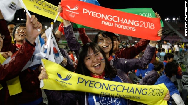 South Koreans celebrate winning the 2018 Winter Olympics at Alpensia Resort on July 7, 2011 in Pyeongchang.