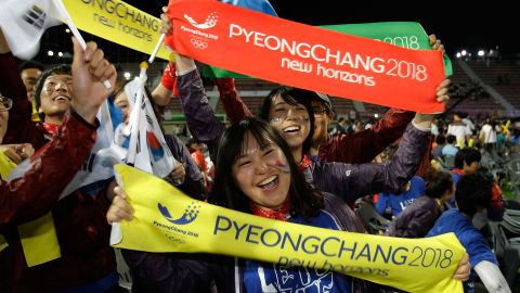 South Koreans celebrate winning the 2018 Winter Olympics at Alpensia Resort on July 7, 2011 in Pyeongchang.