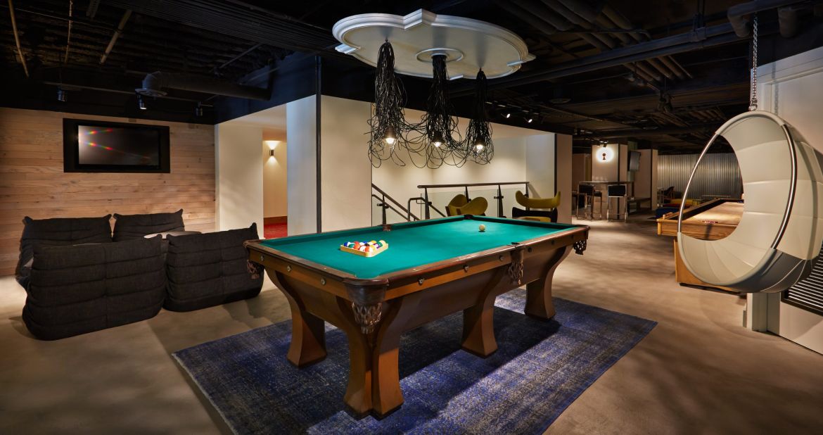 At San Francisco's new Hotel Zetta, the playroom includes a combination of old-school and new games, from shuffleboard and billiards to Wii and a life-size Jenga. 