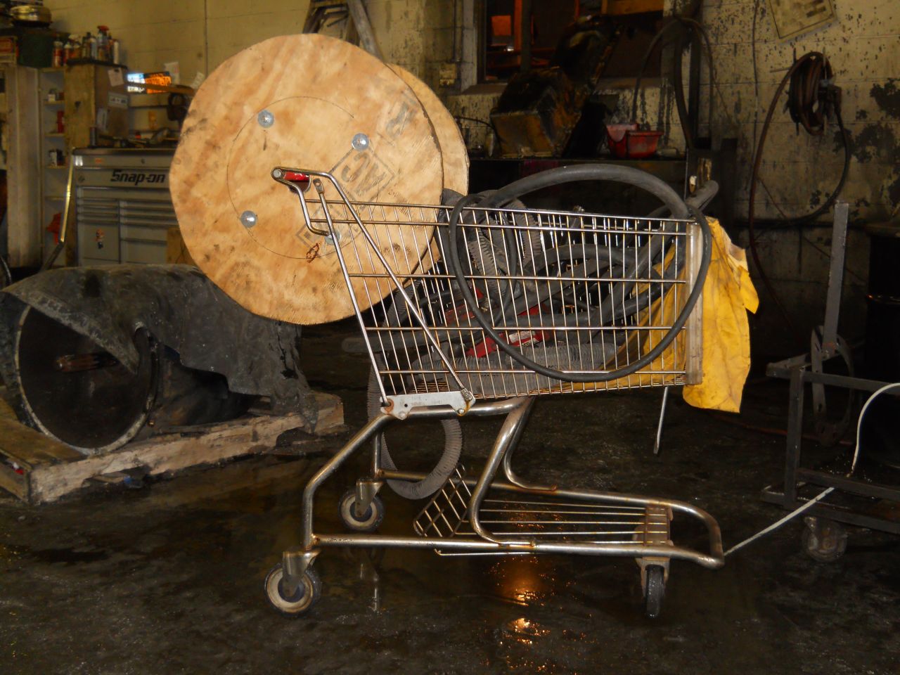 A mechanic attached a <a href="http://ireport.cnn.com/docs/DOC-1093315">steam jenny hose</a> to a shopping cart that was kept in an old trucking terminal in Rochester, New York. 