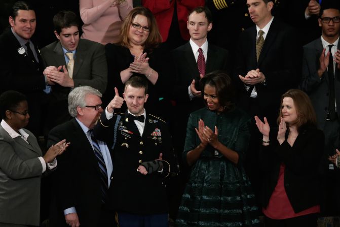 On January 28, 2014, Remsburg and his father, Craig, were special guests at the State of the Union Address, sitting beside first lady Michelle Obama. Toward the end of Obama's address, he acknowledged Remsburg, followed by a standing ovation from all of Congress that went on for nearly two full minutes.