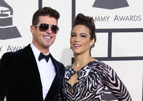 Actress Paula Patton <a href="http://www.cnn.com/2014/10/09/showbiz/thicke-patton-divorce-filing/index.html">filed for divorce from her husband</a>, singer Robin Thicke, in October 2014. The couple, who mutually <a href="http://i2.cdn.turner.com/cnn/dam/assets/140519094748-andy-samberg-may-2014-story-top.jpg" target="_blank" target="_blank">decided to separate in February</a>, have one child together, Julian Fuego. 