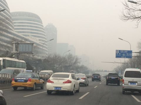 Smog blankets Beijing traffic -- a regular experience in the Chinese capital in recent times.