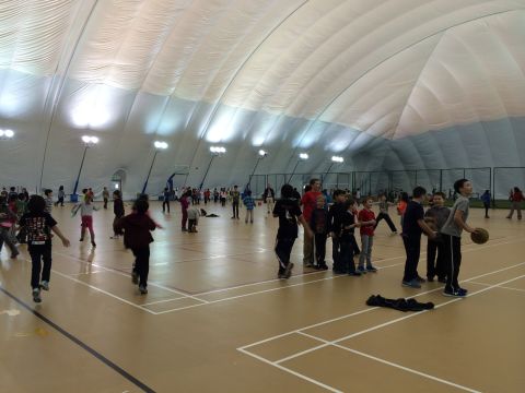 Students spend their break times under the school's clean-air dome.