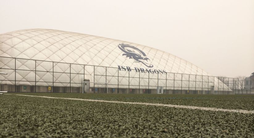 The International School of Beijing has erected a huge dome to allow kids space to roam and breathe. 