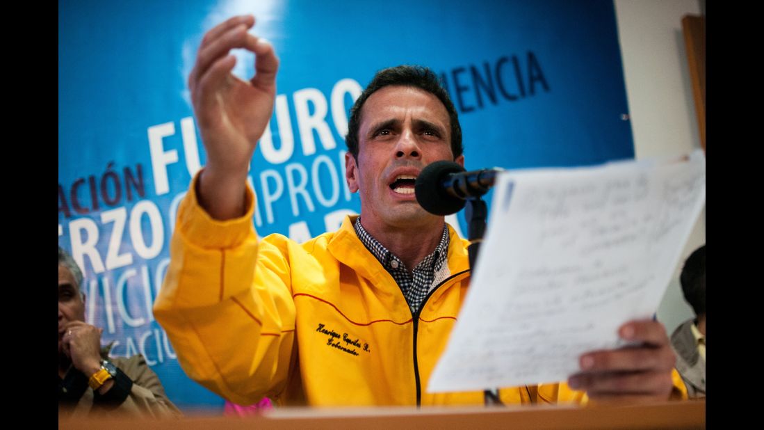 Henrique Capriles, an opposition leader and governor of the Venezuelan state of Miranda, joins in a news conference February 24 in Caracas. Opposition leaders and government officials blame each other for the unrest, and both sides show no sign of backing down. 