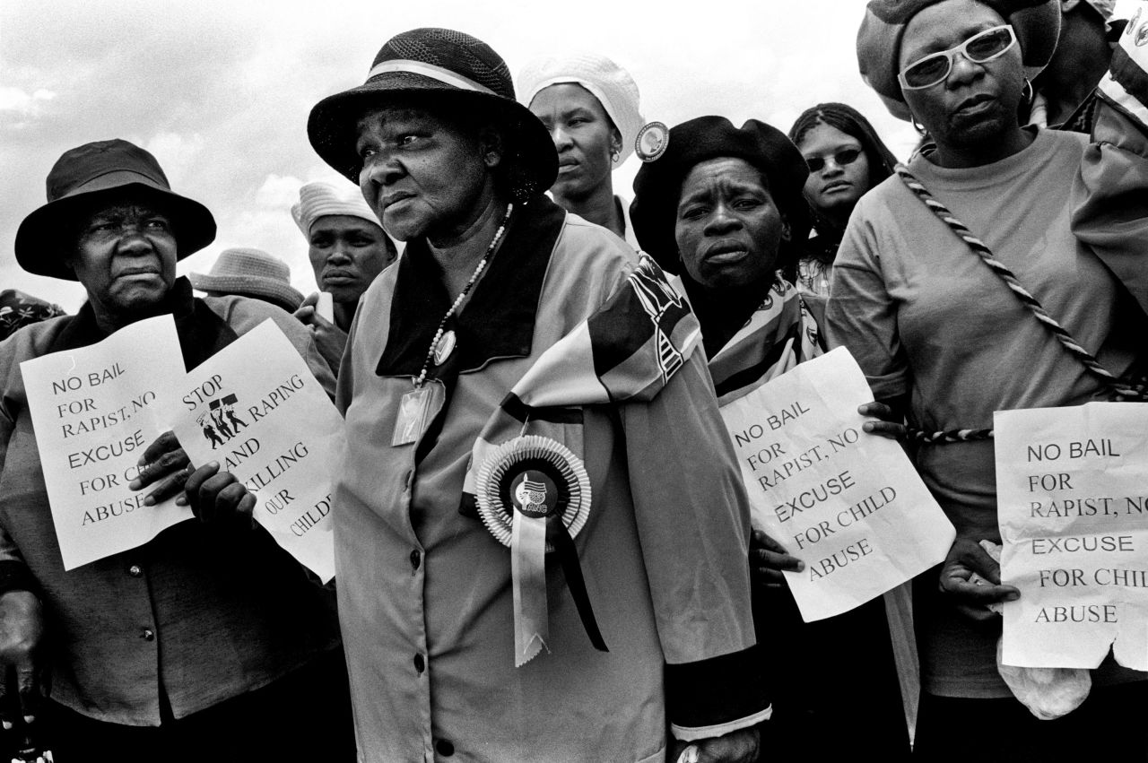 Women at the funeral of three-year-old Sibongile Mokoena in Soweto. Sibongile was raped and murdered in November 2003.