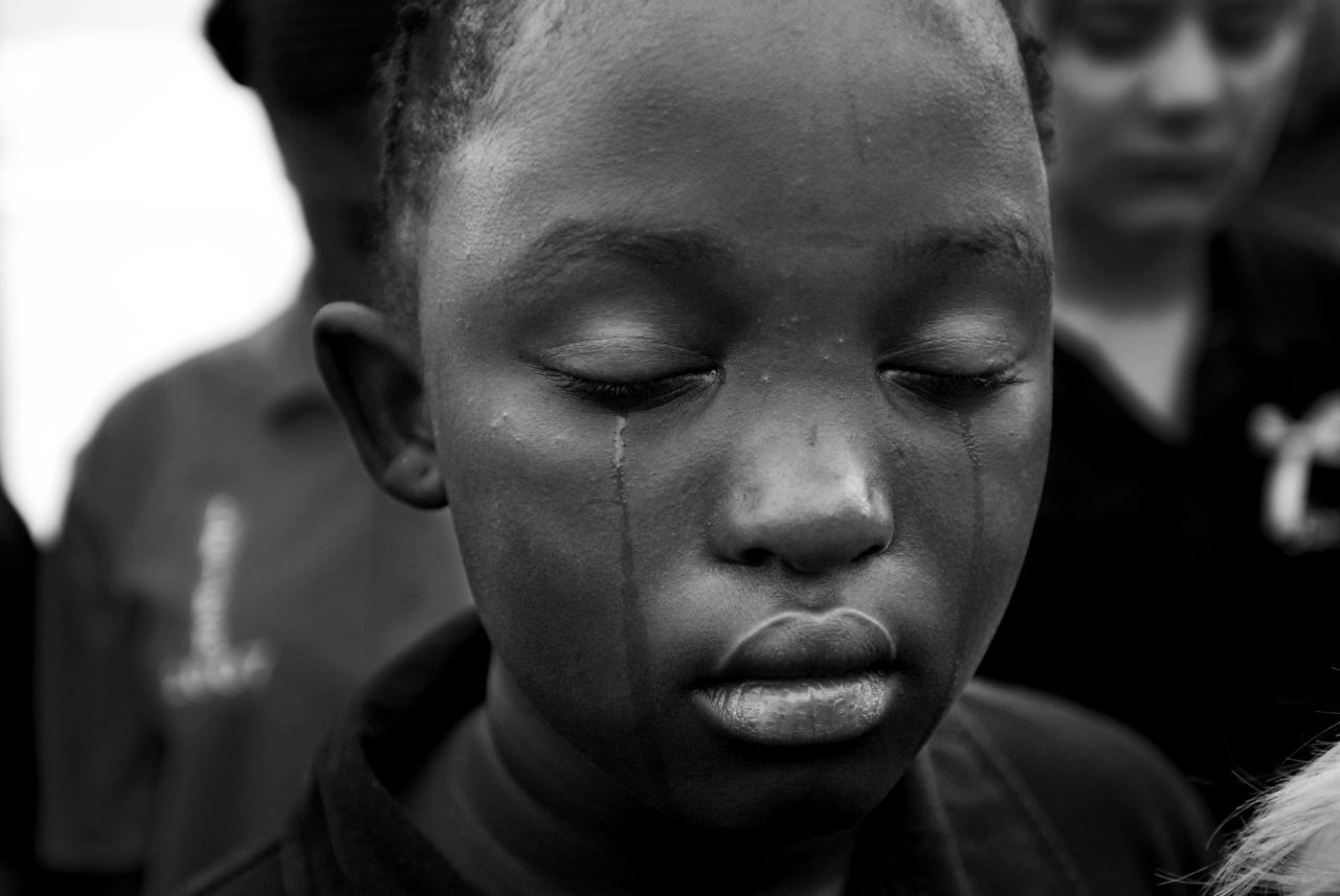 Classmates of seven-year-old Sheldean Human at her Pretoria funeral in 2007. A suspect confessed the crime to police, and was later beaten to death in prison.