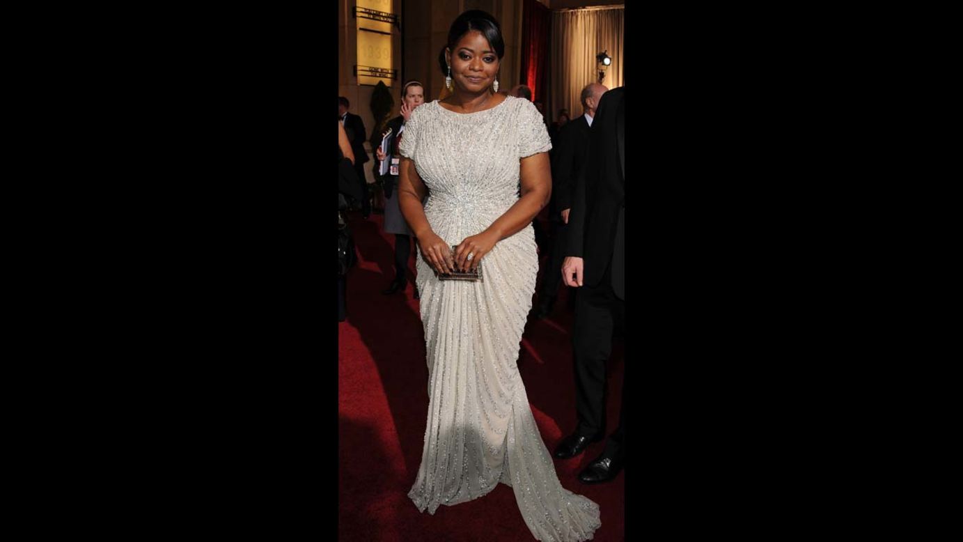 With her side-swept hair and curve-hugging column gown, Octavia Spencer was the very picture of classy glamour as she accepted the best supporting actress Oscar at the 2012 ceremony. 