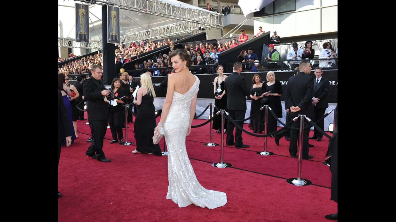 As Milla Jovovich proved at the 2012 Oscars, you don't need to be a nominee to steal the show. The "Resident Evil" actress looked like she'd been poured into her white Elie Saab gown, and her retro hairdo recalled old Hollywood at its finest. 
