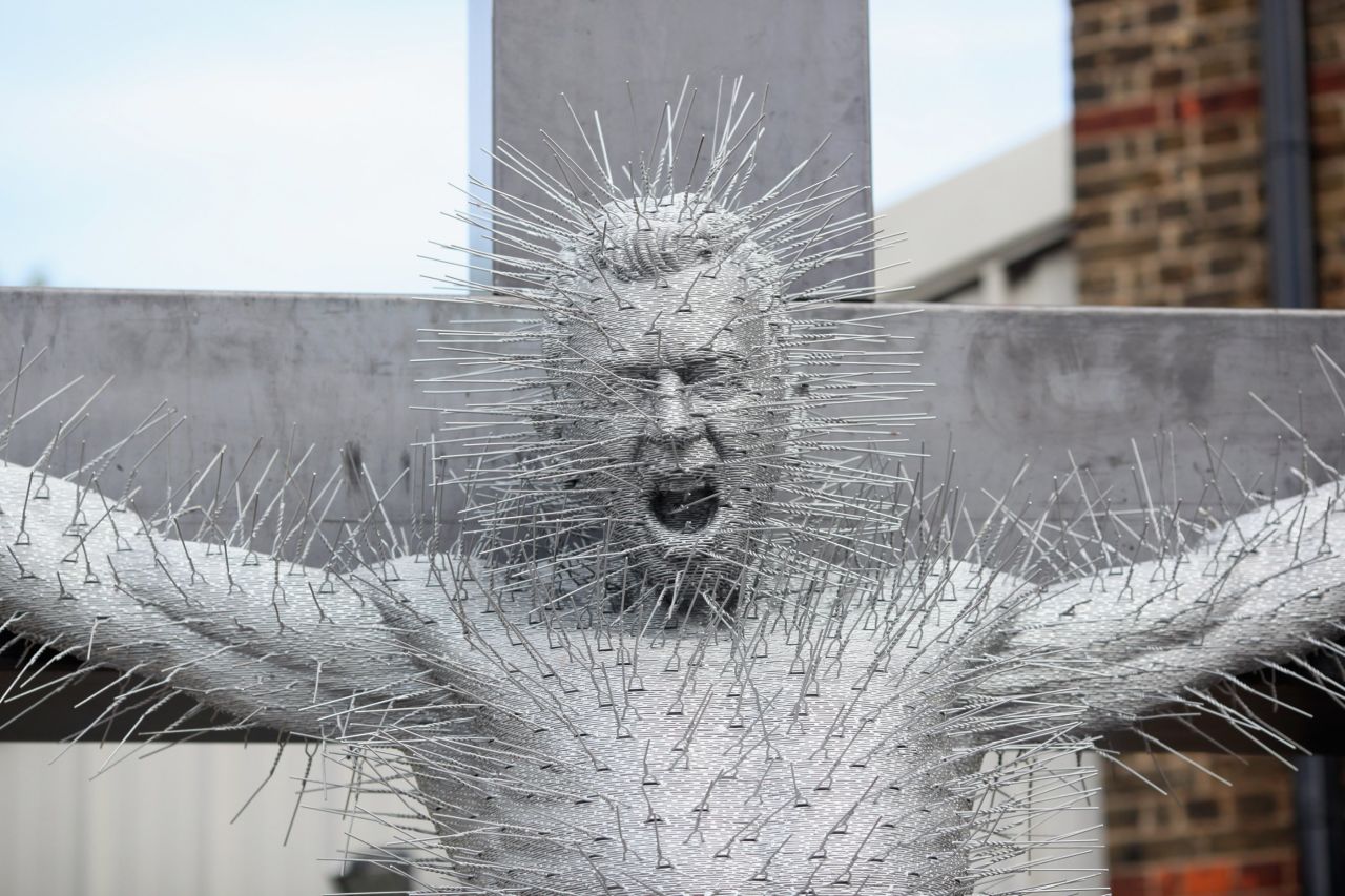 His work has proved varied, such as "Die Harder," which depicts Jesus' crucifixion and is made entirely of metal coat hangers.