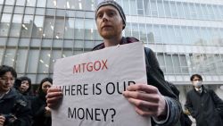 Bitcoin trader Kolin Burges from London protests against Tokyo-based bitcoin changer MtGox in front of the company's office in Tokyo on February 26, 2014.